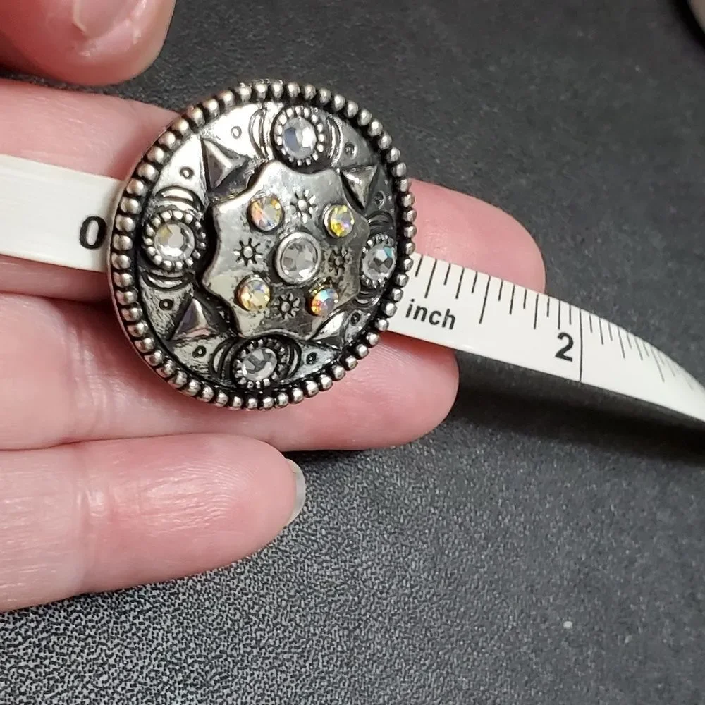 Silver tone circular sparkly ring